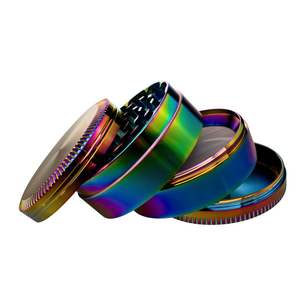 "Four-Piece Anodized Grinder splayed out to show all compartments of the tool on a white background," - Up N Smoke.