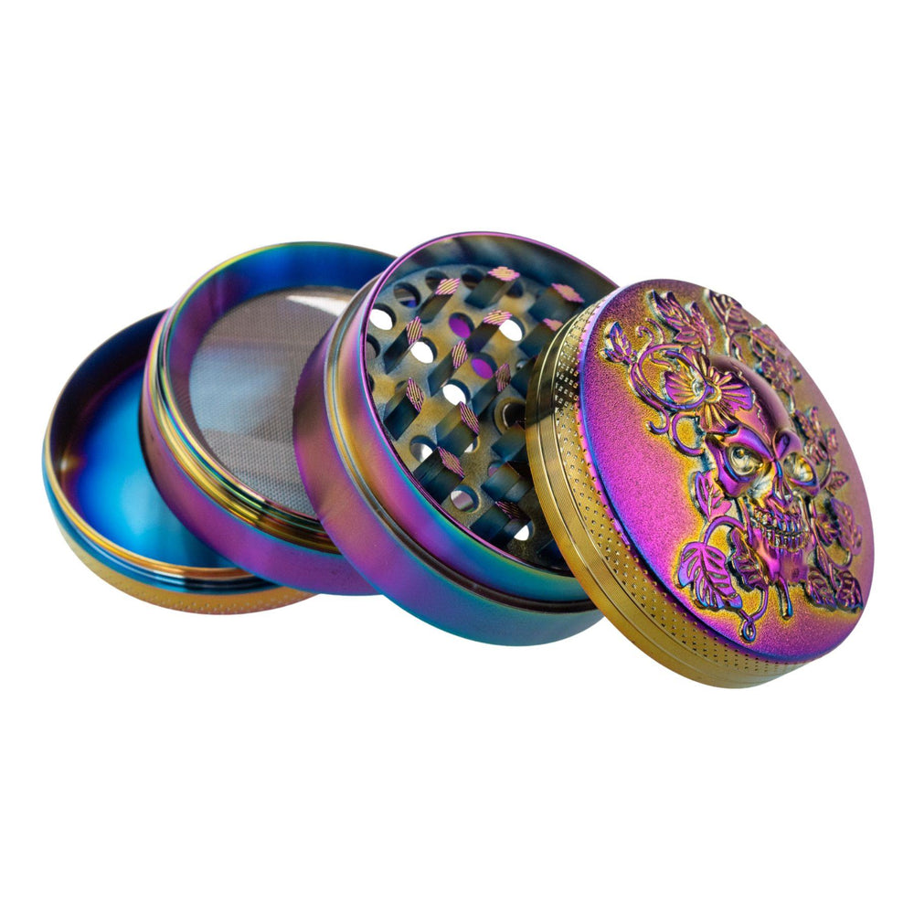 "Anodized 4-Piece Skull Grinder splayed out to showcase the four compartments," - Up N Smoke.
