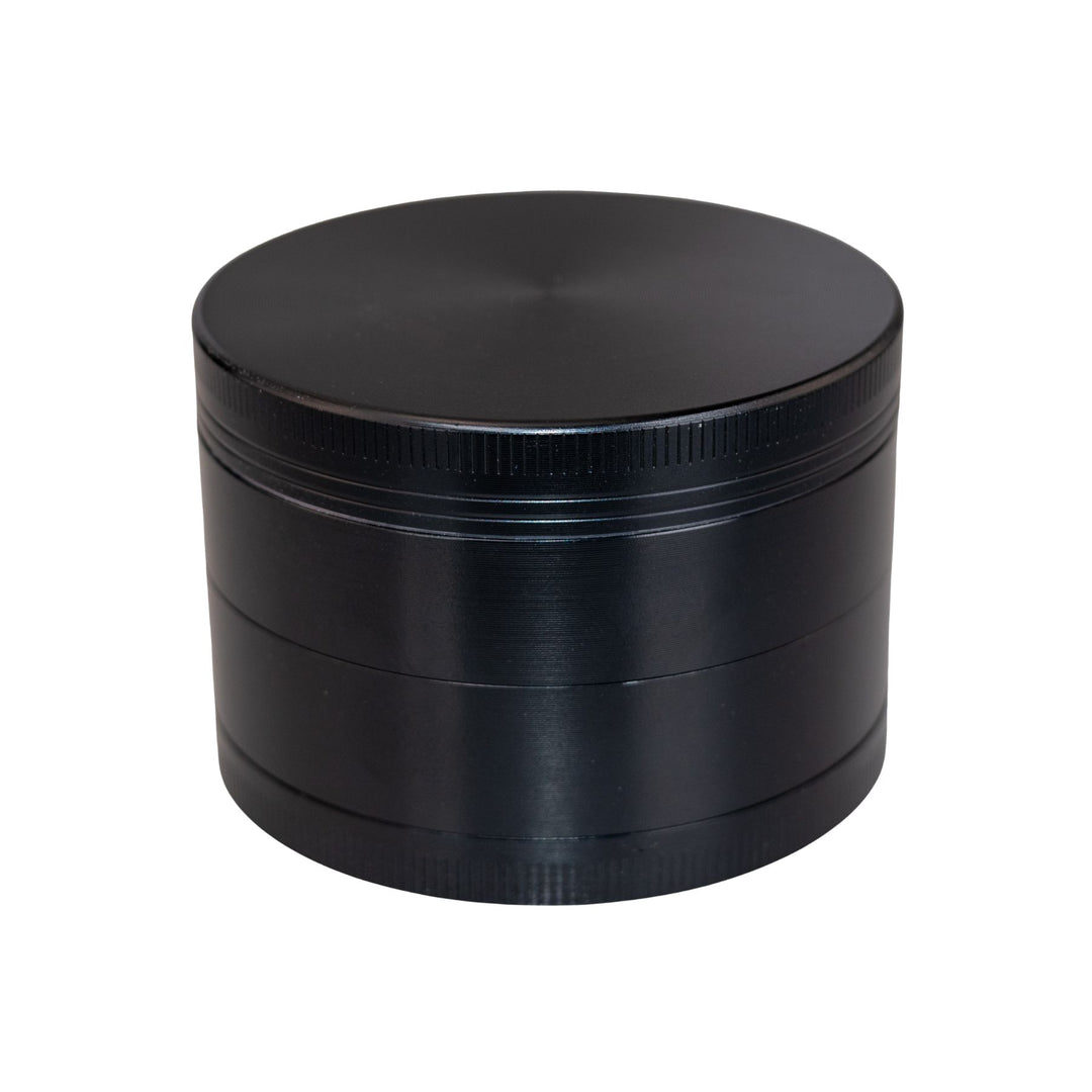 "Black Classic 4-Piece Grinder on a white background," - Up N Smoke.