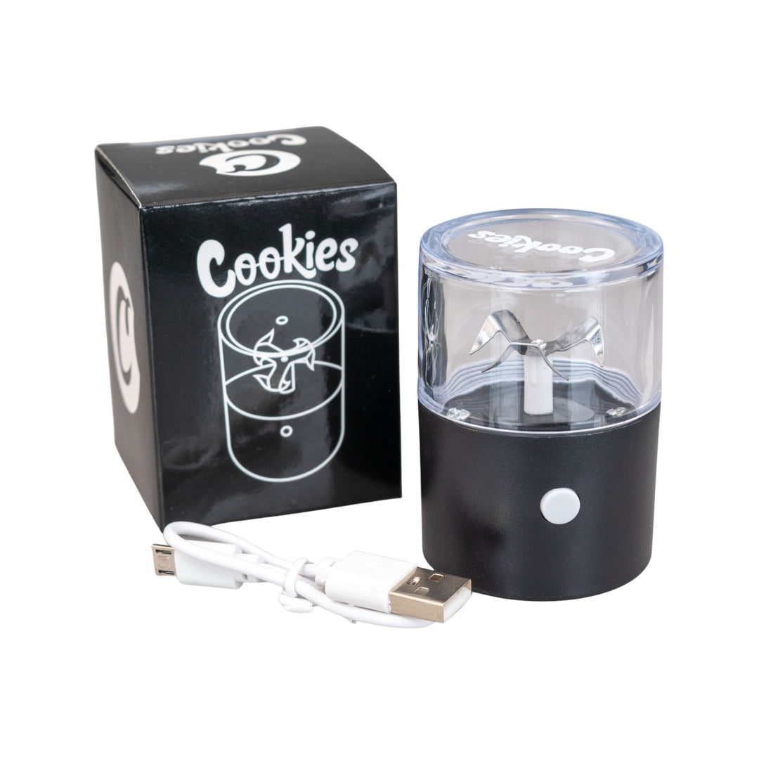"Black Cookies Electric Grinder in front of the box it comes in and next to the included micro USB charger," - Up N Smoke.
