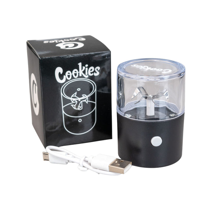 "Black Cookies Electric Grinder in front of the box it comes in and next to the included micro USB charger," - Up N Smoke.