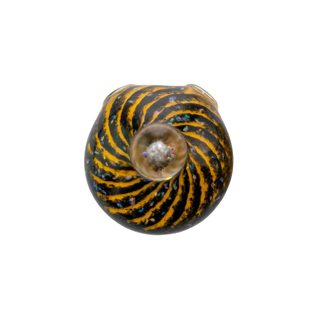 "Top-down view of a black with yellow Merican Glass Opal Spiral Pendant on a white background," - Up N Smoke.