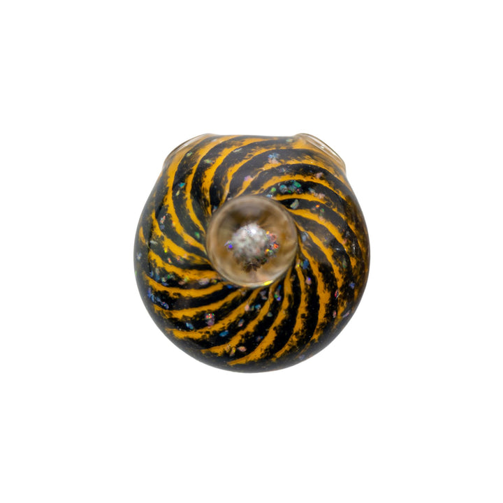 "Top-down view of a black with yellow Merican Glass Opal Spiral Pendant on a white background," - Up N Smoke.
