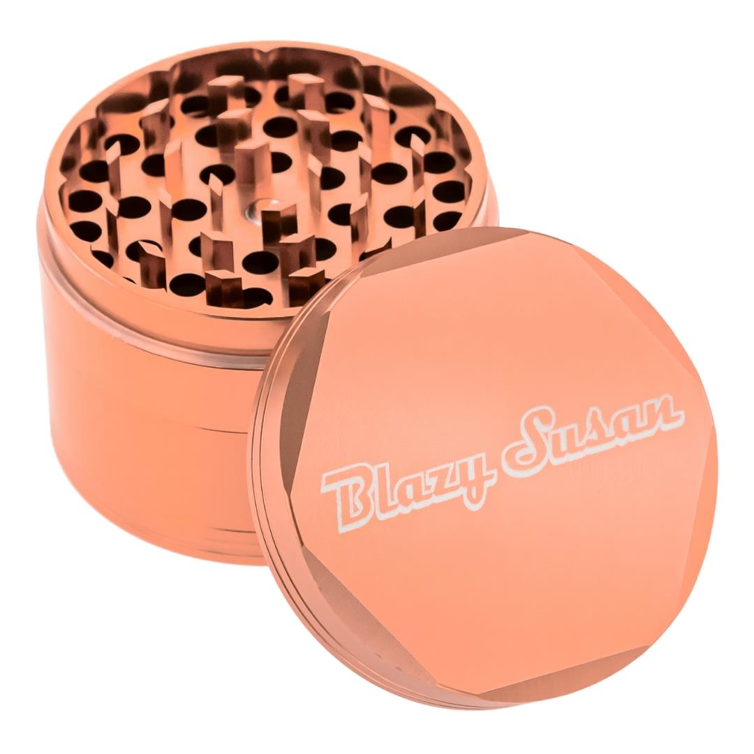 Blazy Susan 4 Piece Rose Gold Grinder displayed on a white background - Up N Smoke