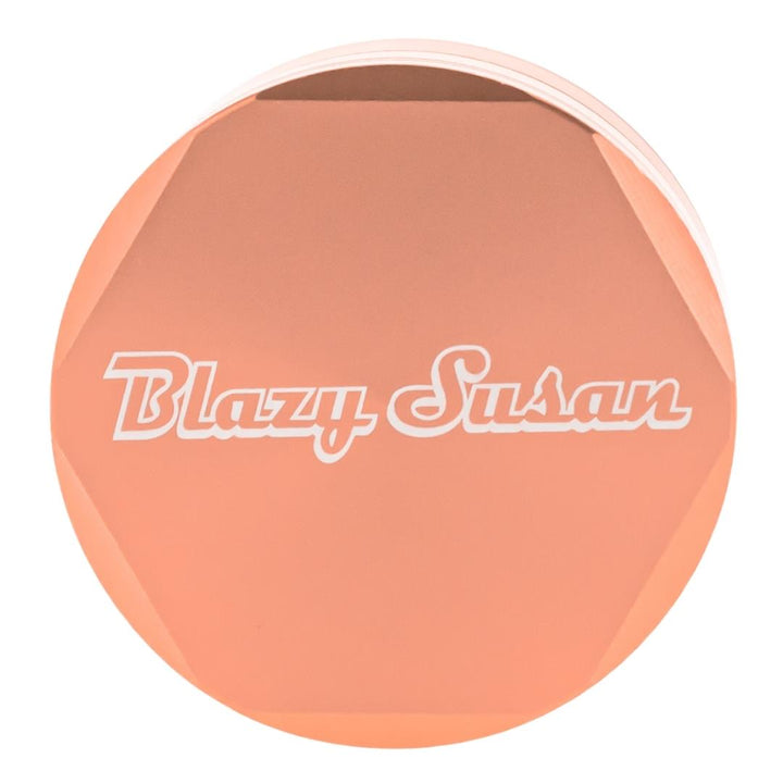 Blazy Susan 4 Piece Rose Gold Grinder displayed on a white background front angle - Up N Smoke