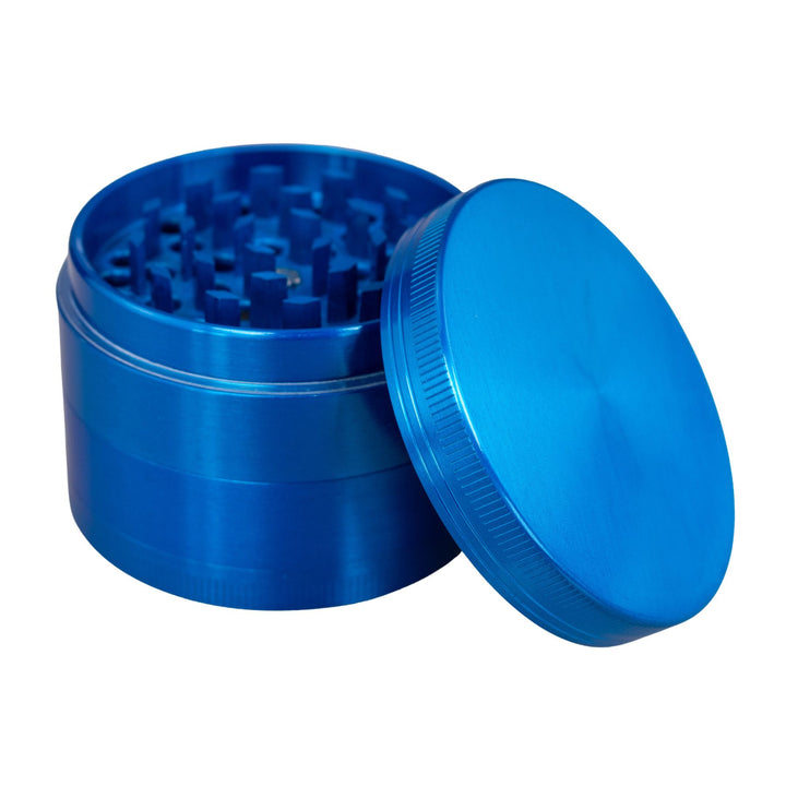 "Blue Classic 4-Piece Grinder with its lid propped up against the rest of the tool," - Up N Smoke.