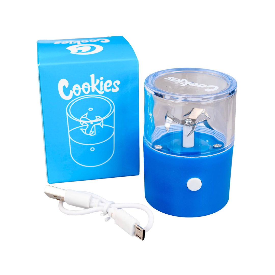 "Blue Cookies Electric Grinder that comes with a micro USB charging cable on a white background," - Up N Smoke.