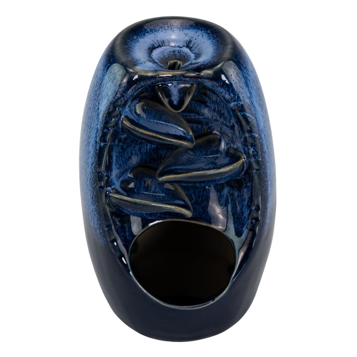 "Blue ceramic incense burner on a white background," - Up N Smoke.
