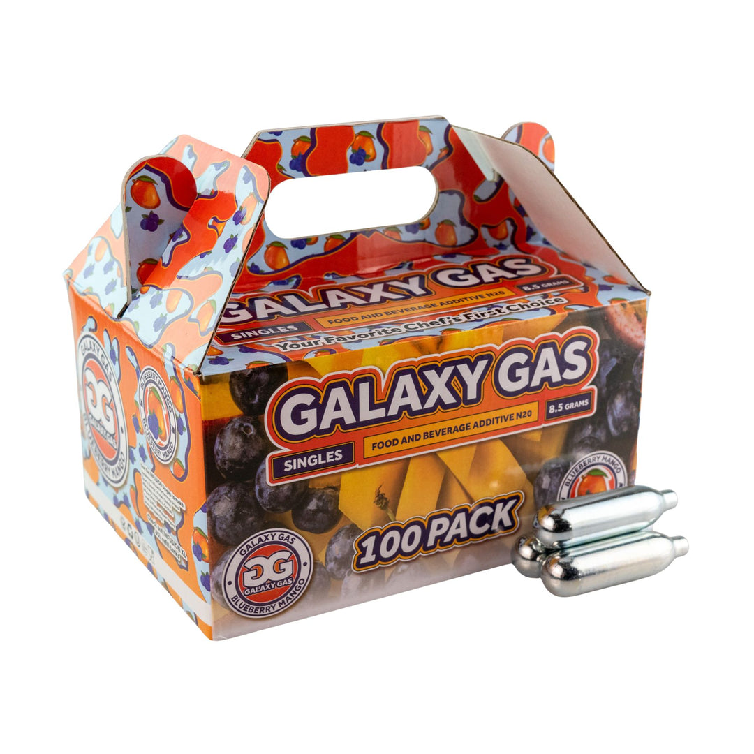 "Side angle of a 100ct box of Blueberry Mango Galaxy Gas with three cartridges in front on a white background," - Up N Smoke.