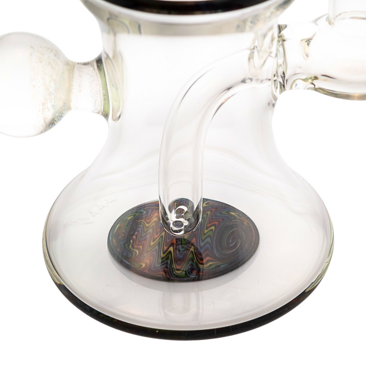 "Close-up of the bottom of a Boss Haas Wig Wag Rig that features the diffused fixed inline and a colorful rainbow design," - Up N Smoke.