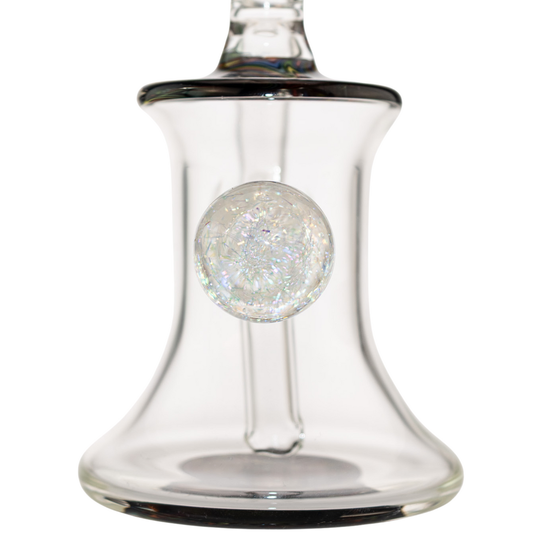 "Close-up of the dichroic bead on the backside o fa Boss Haas Wig Wag Rig on a white background," - Up N Smoke.