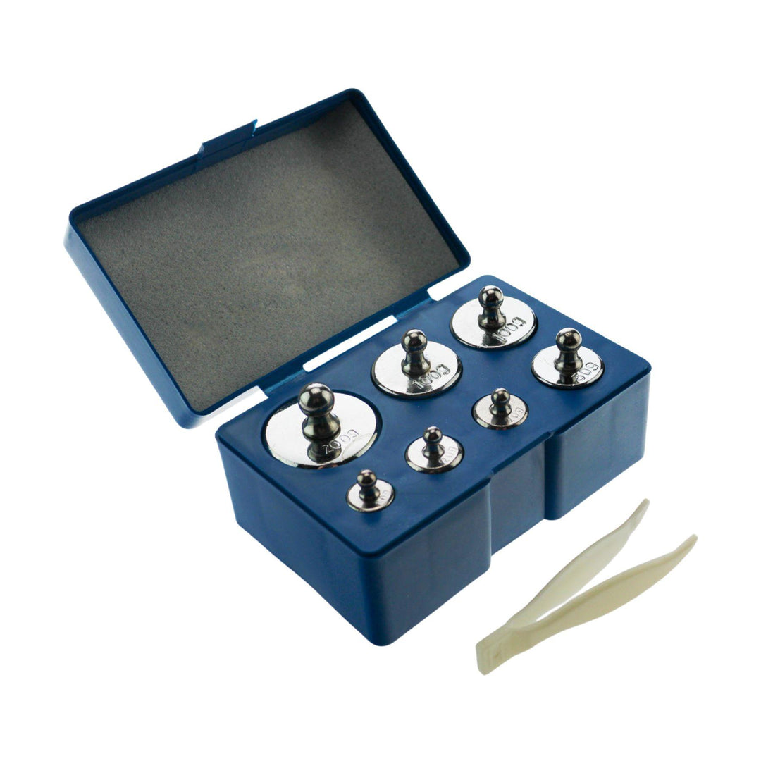 "500g Calibration Weight Set with its lid open showcasing the seven calibration weights on a white background," - Up N Smoke.