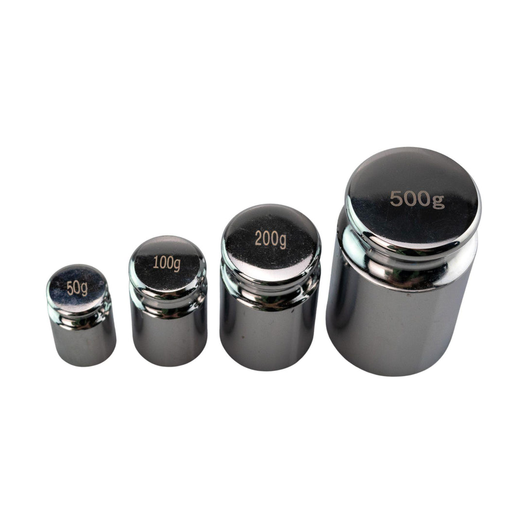 "Four Calibration Weights that are 50g, 100g, 200g, and 500g, on a white background," - Up N Smoke.