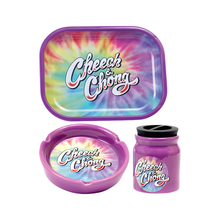 "Tie-dye rolling tray with 'Cheech & Chong' branding, accompanied by an ashtray and a small container on a white background," - Up N Smoke.