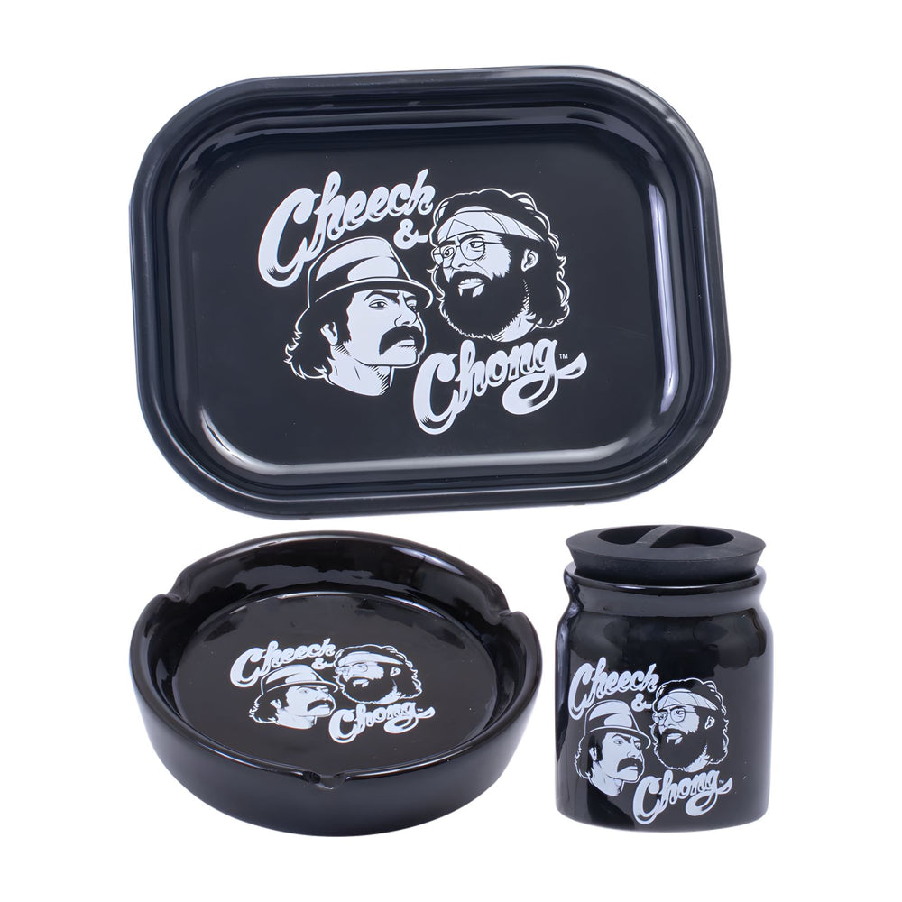 "Black rolling tray with 'Cheech & Chong' design, accompanied by a black container and ashtray on a white background," - Up N Smoke.