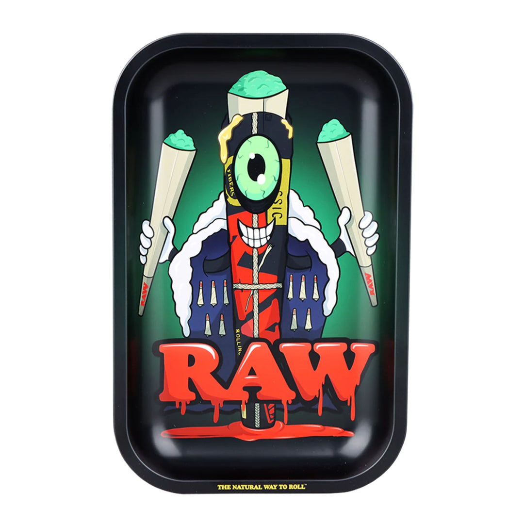 "RAW Cone Monster Rolling Tray with the design of a one-eyed personified cone holding up two large cones on a black tray," - Up N Smoke.