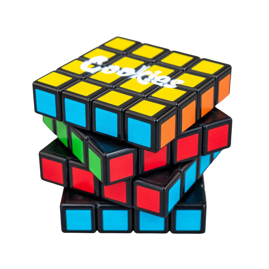 "Cookies Rubik's Cube Grinder that features four compartments and comes with a plastic tool," - Up N Smoke.