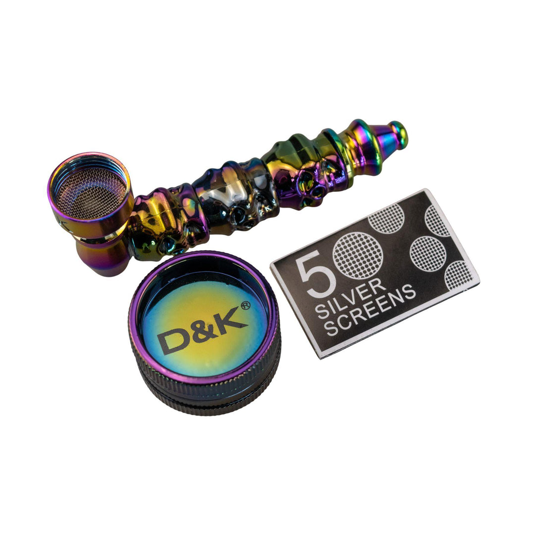 "An anodized D&K Skull Pipe next to a matching two-piece grinder and a pack of five silver screens," - Up N Smoke.