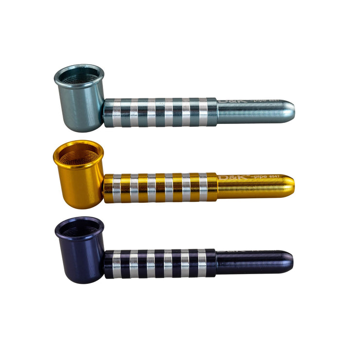 "Three D&K Metal Stripe Pipes in the color variations teal, gold, and indigo, on a white background," - Up N Smoke.