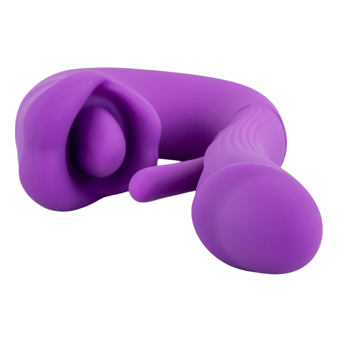 Dildo Vibrator with Tongue displayed on a white background close up  - Up N Smoke