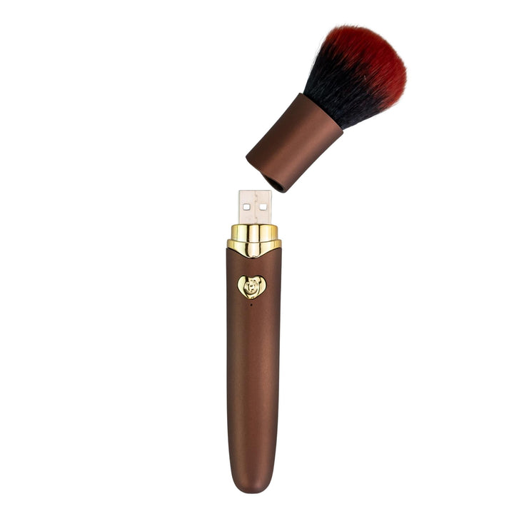 Discreet Makeup Brush Vibrator with usb charging rose gold color showcasing charging port photo on a white background - Up N Smoke