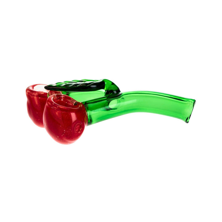 "A 5.5-inch glass hand pipe designed as two red cherries with green stems. Both cherries are functional, and a carb is positioned on the left side, making this a playful and practical smoking tool." - Up N Smoke.