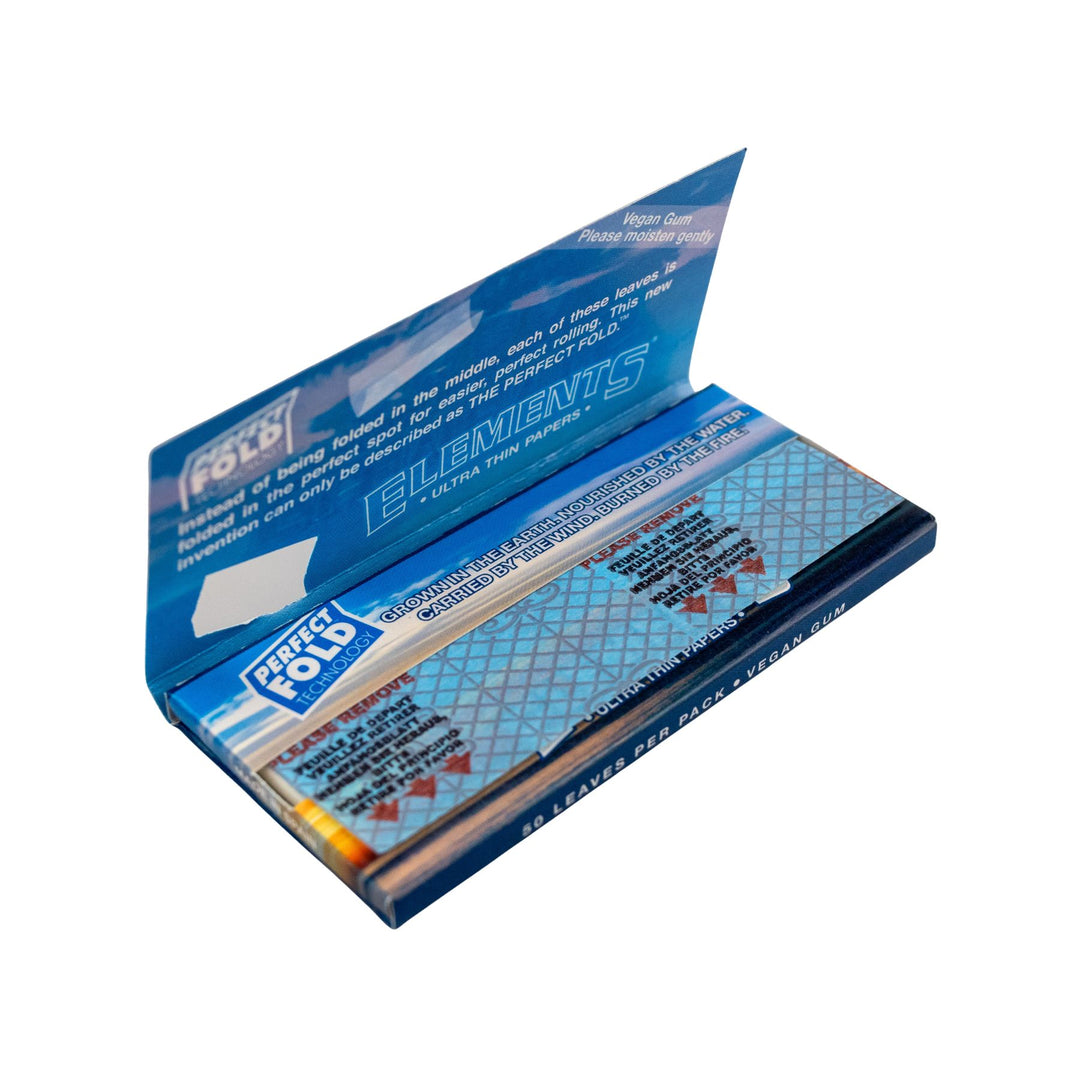 "Open Elements Ultra Thin Perfect Fold Papers pack that has 50 leaves within on a white background," - Up N Smoke.