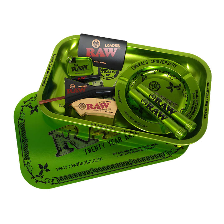 "Emerald RAW 20th Anniversary Kit that includes a rolling tray, doob tubes, cone tips, cone loader, and more," - Up N Smoke.