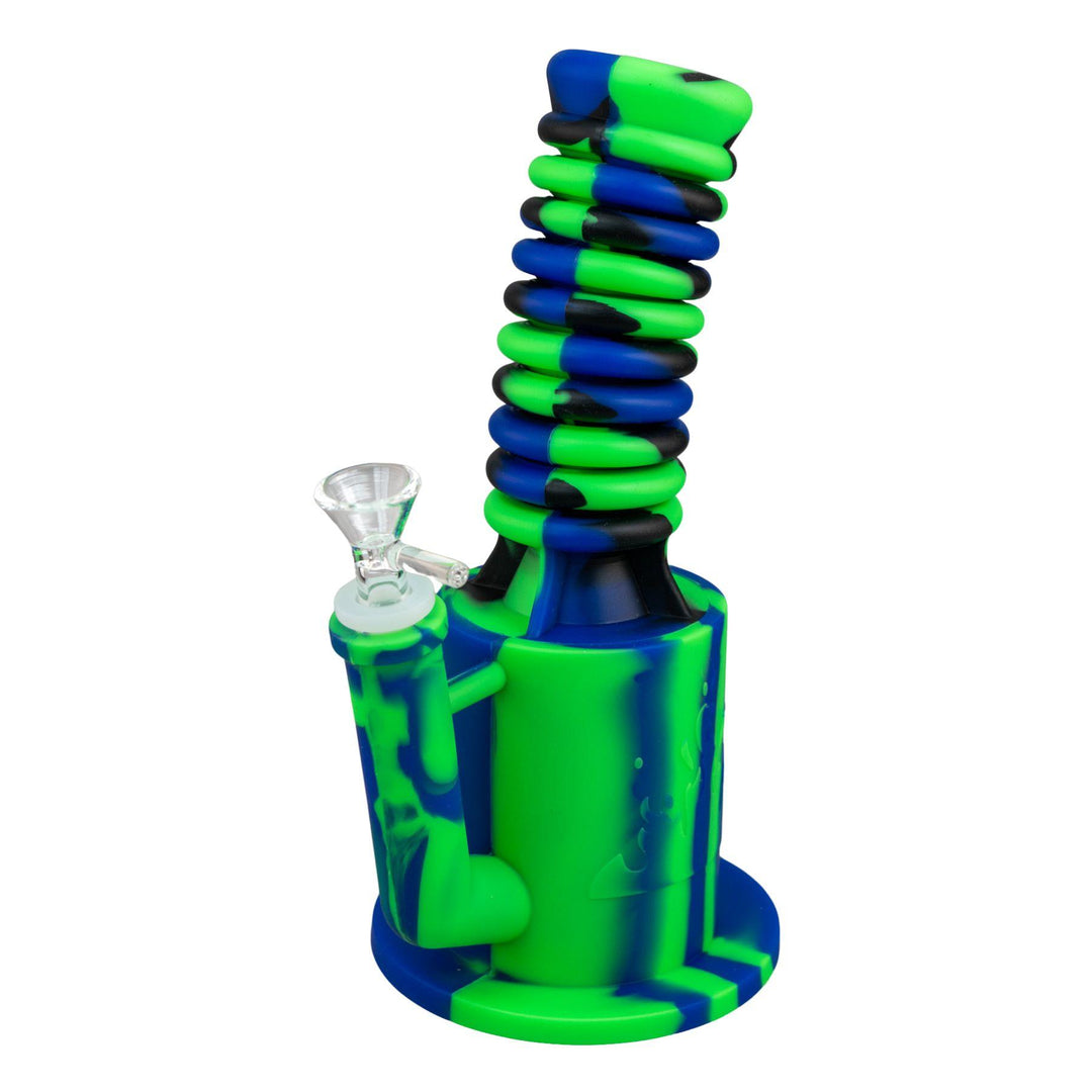 "Colorful silicone smoking device with green, blue, and black design on a white background," - Up N Smoke.