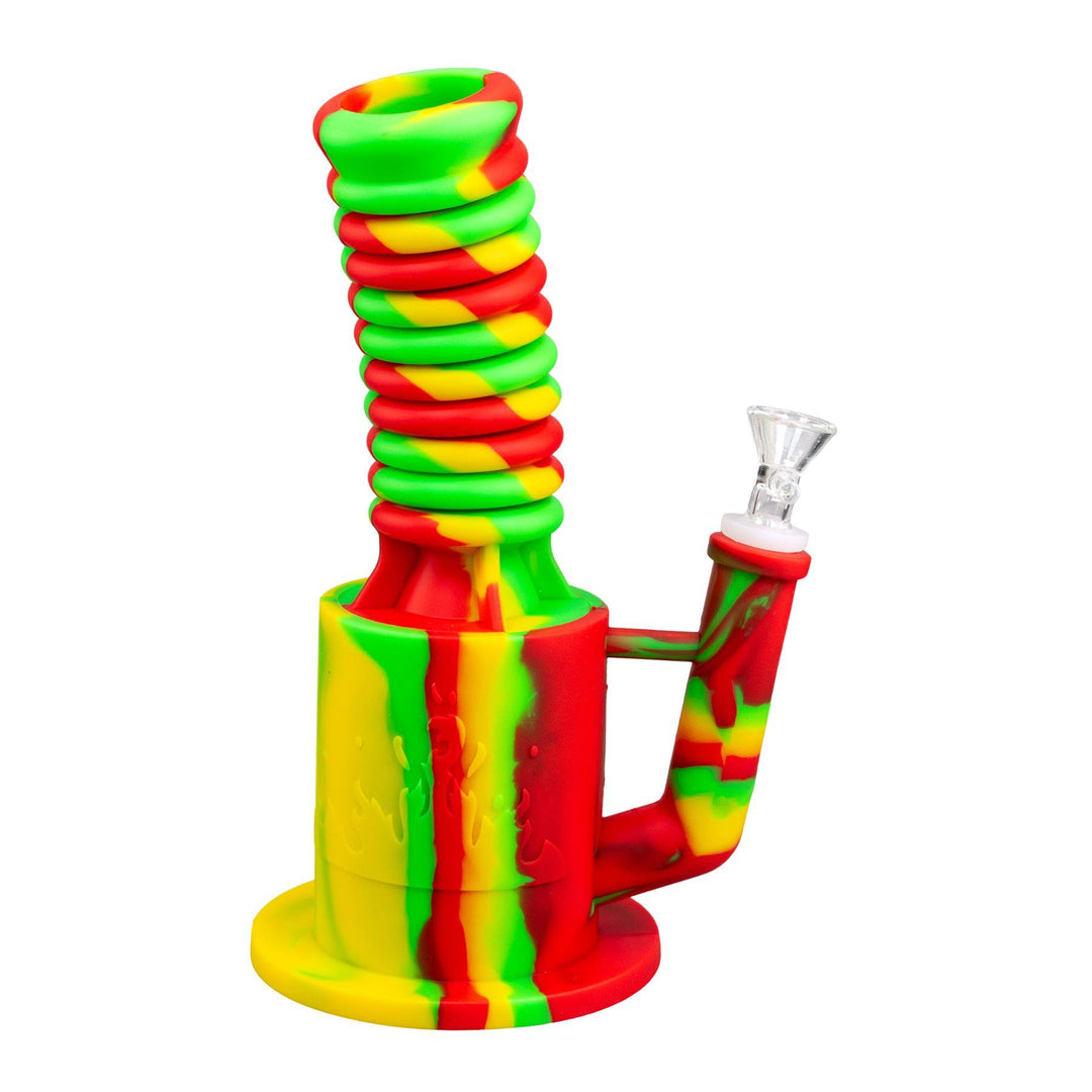 "Right-side view of a Rasta-colored Expandable Silicone water pipe on a white background," - Up N Smoke. 