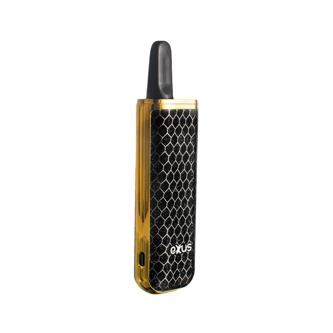 "An Exxus vape device with black and gold designs on a white background," - Up N Smoke.