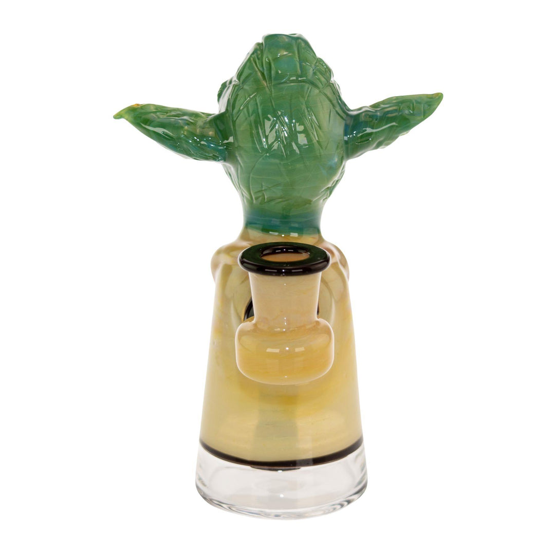 "Backside of a Jon Fischbach Yoda Rig on a white background," - Up N Smoke.