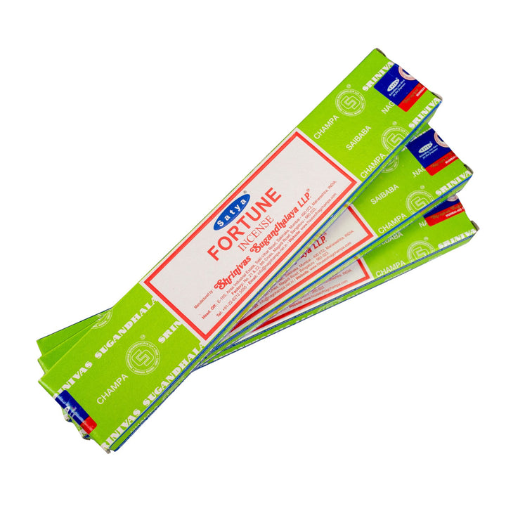 Three pack of Satya Fortune incense sticks on a white background - Up N Smoke