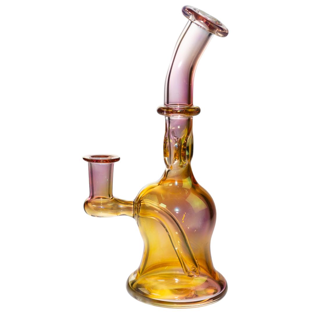 Left side view of a pink and gold Frank Plays water pipe with a fixed downstem and a donut recycler. - Up N Smoke.