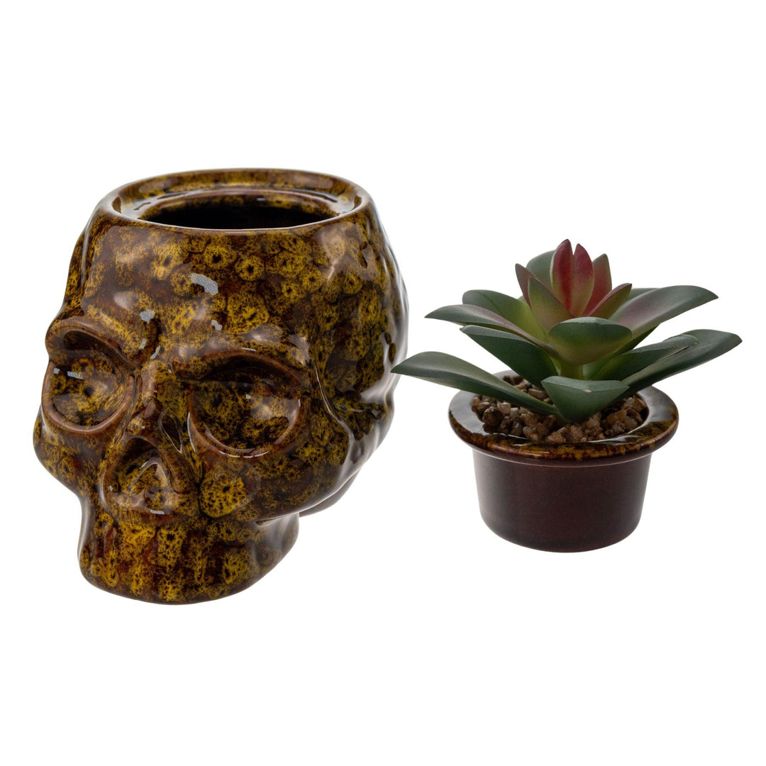 "Yellow ceramic Fujima Skull Planter Stash Jar with its lid removed on a white background," - Up N Smoke.