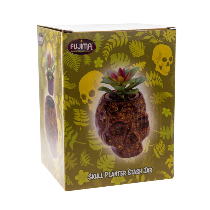 "Box of a yellow Fujima Skull Planter Stash Jar on a white background," - Up N Smoke.