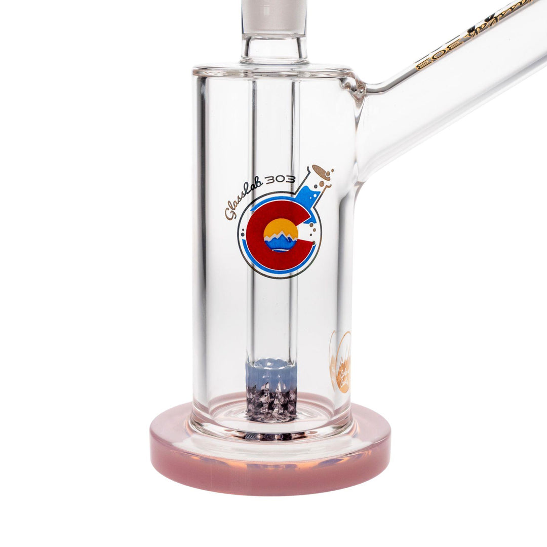 "Close-up of the interior of a Pink Glass Lab 303 Skinny 51 Water Pipe, showcasing the purple and blue colored-lace percolator," - Up N Smoke.