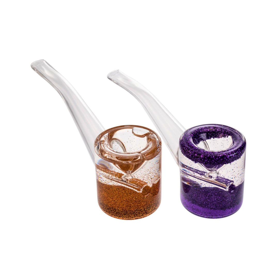 "Two 5-inch glycerin glitter hammer pipes in gold and purple with clear, sherlock-style stems, designed for freezing to provide smoother hits." - Up N Smoke.