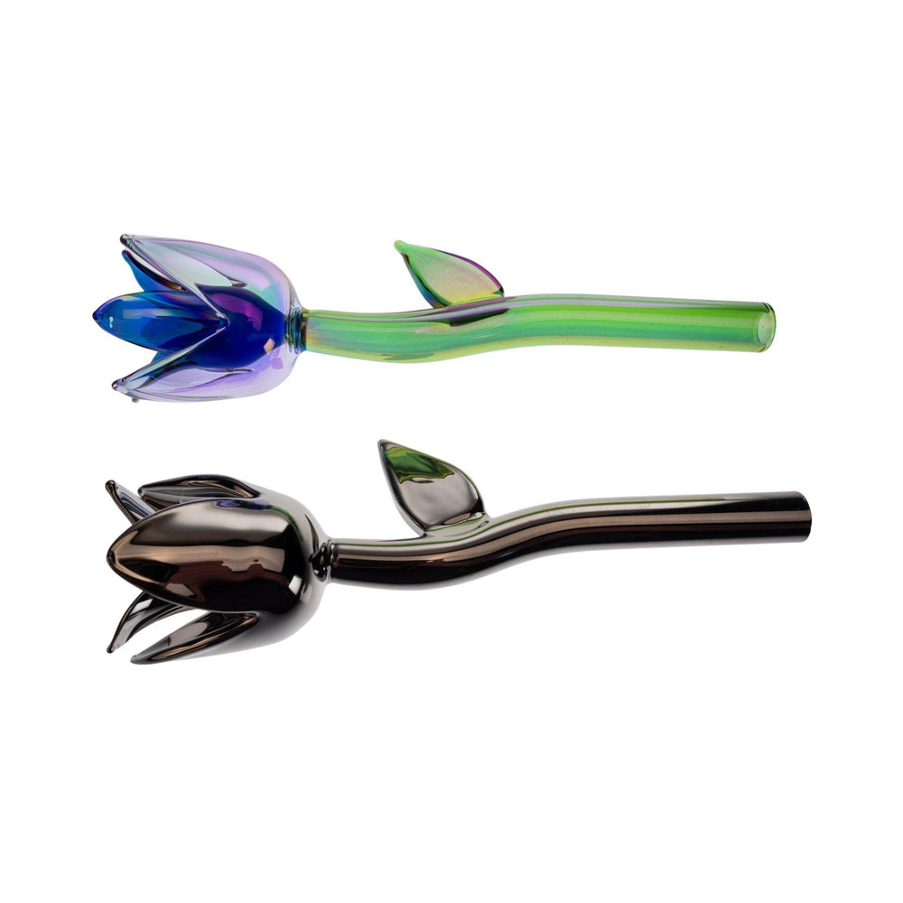 "Two flower-shaped one hitters, one with a vibrant iridescent psychedelic finish and the other in a sleek chrome finish, each resembling a flower stem with a bloom and leaf detail." - Up N Smoke.