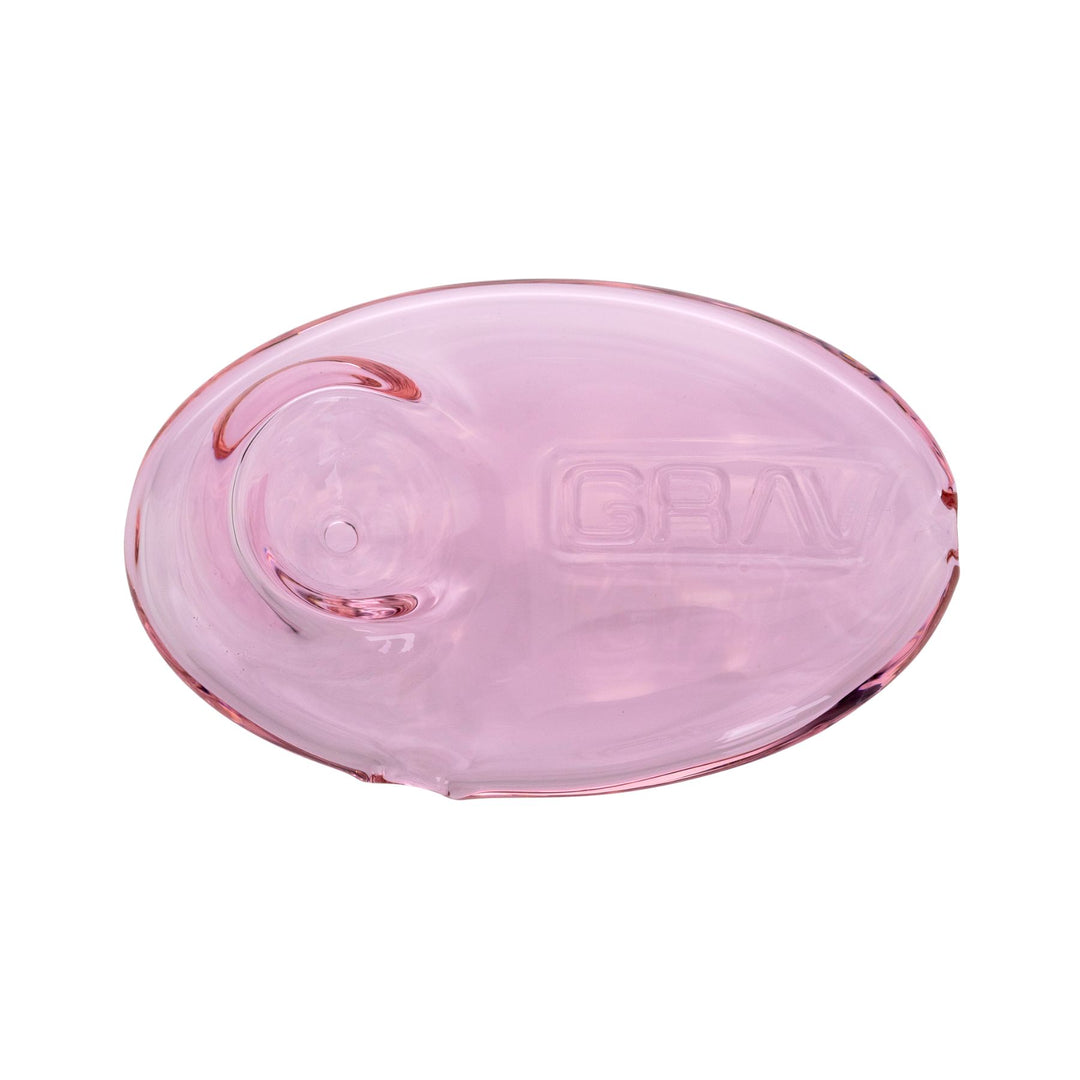 "Top-down view of a pink Grav Labs Pebble Spoon on a white background," - Up N Smoke.