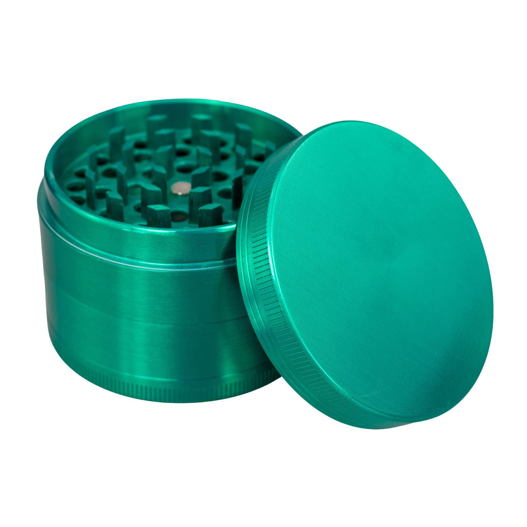 "Green Classic 4-Piece Grinder with its lid propped up against the rest of the tool," - Up N Smoke.