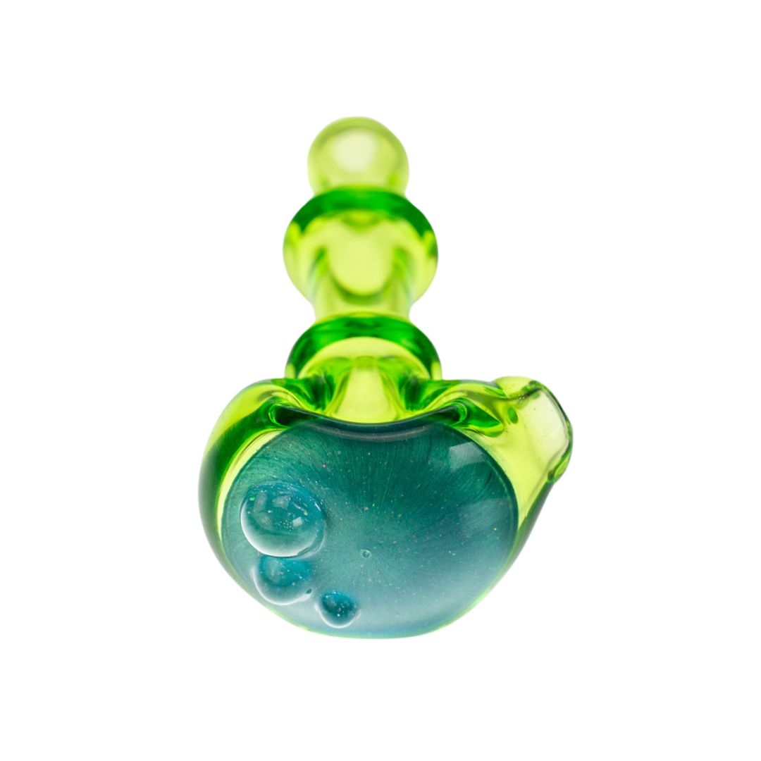 Fully frontal photo of a Tagle Glass hand pipe. This spoon features a vivid blue opal at the head of the pipe that shimmers in the light. - Up N Smoke.
