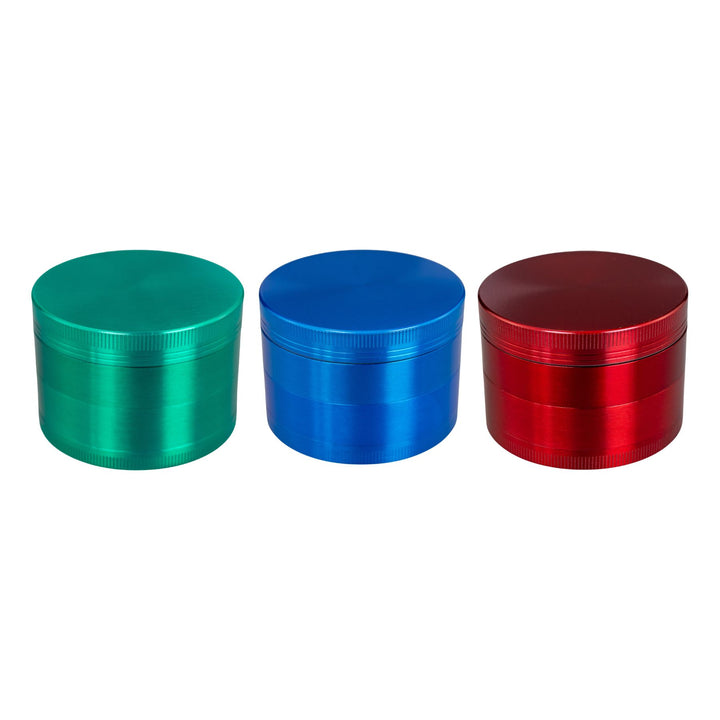 "Three Classic 4-Piece Grinders in the colors green, blue, and red," - Up N Smoke.