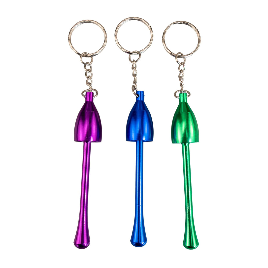 "Group of three Mushroom Keychain Hand Pipes in the color variations purple, blue, and green," - Up N Smoke.
