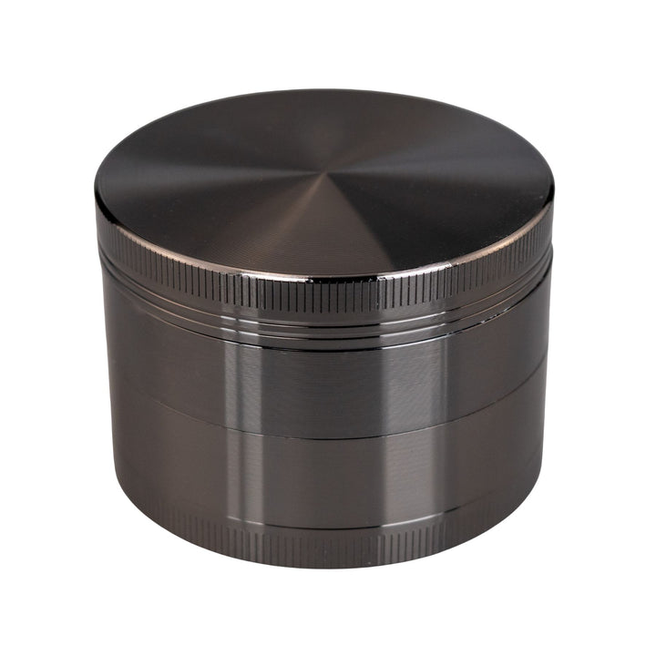 "Gunmetal Classic 4-Piece Grinder on a white background," - Up N Smoke.