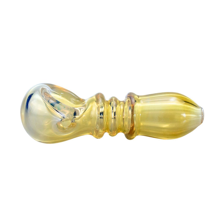 "Close-up of a 3.5-inch handcrafted glass spoon pipe featuring three grip-enhancing ringlets and a vibrant gold-fumed design." - Up N Smoke.