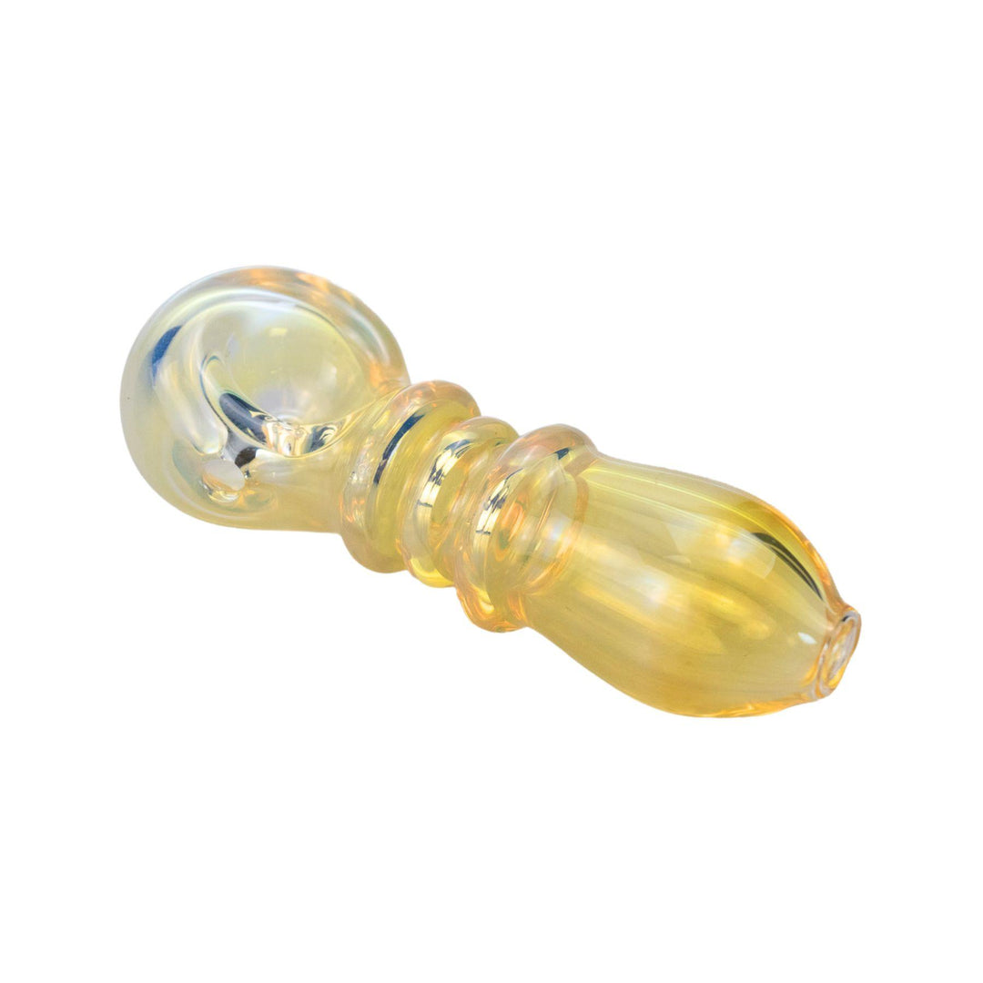 "American-made gold-fumed glass spoon pipe with evolving blue-to-yellow hues and a sleek, travel-friendly design." - Up N Smoke.