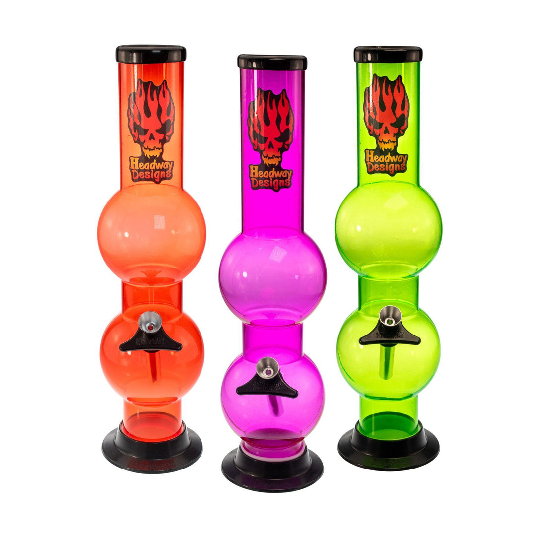 "Three colorful water pipes made by Headway Designs in the colors orange, purple, and light green," - Up N Smoke.