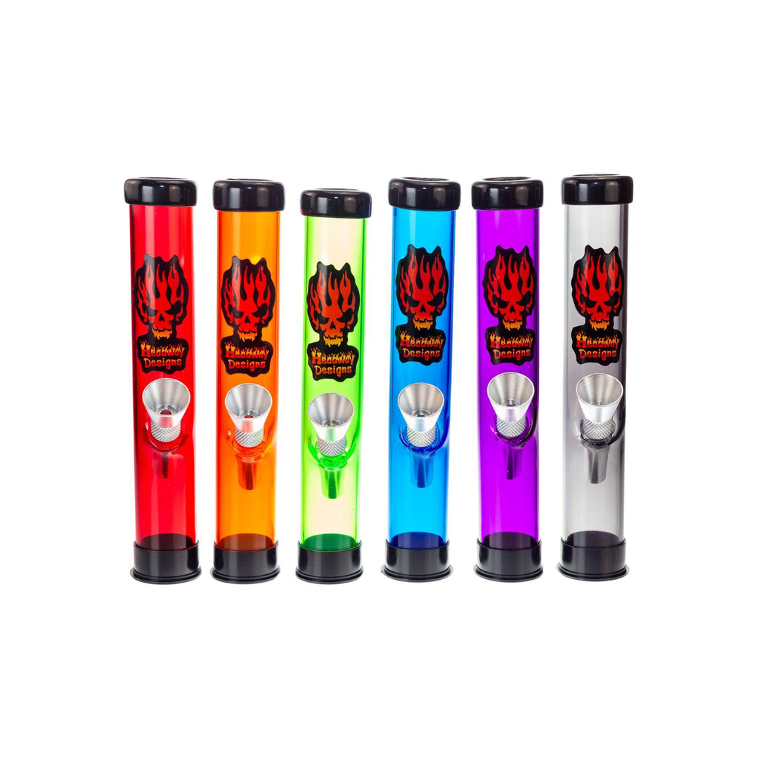 "Colorful acrylic water pipes from Headway Designs, each featuring a flame skull logo. The water pipes are arranged in a row and come in red, orange, blue, and purple. Each water pipe has a black base and top, with a metal bowl on the front." - Down to Earth