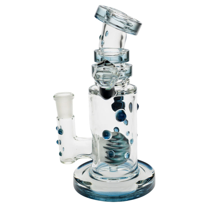 "Left side of a blue Hubbard Rig that has an intricate wig-wag marble within the interior," - Up N Smoke.
